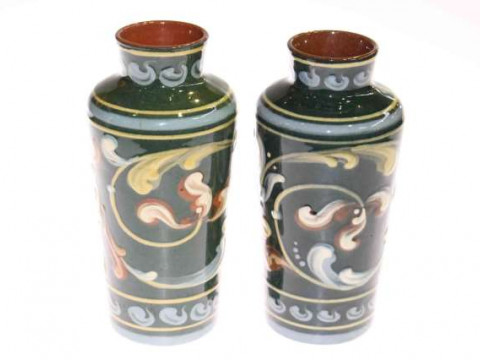 Pair of large Devon Ware vases with scrolling decoration