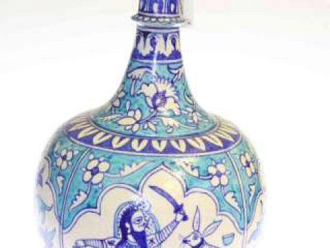 Large Eastern pottery vase with figure and foliage decoration, 44cm high