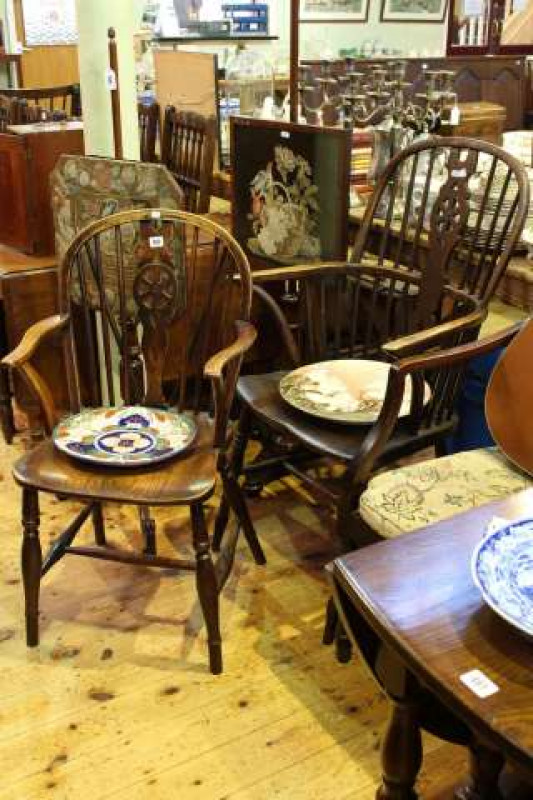 Two elm Windsor wheelback elbow chairs