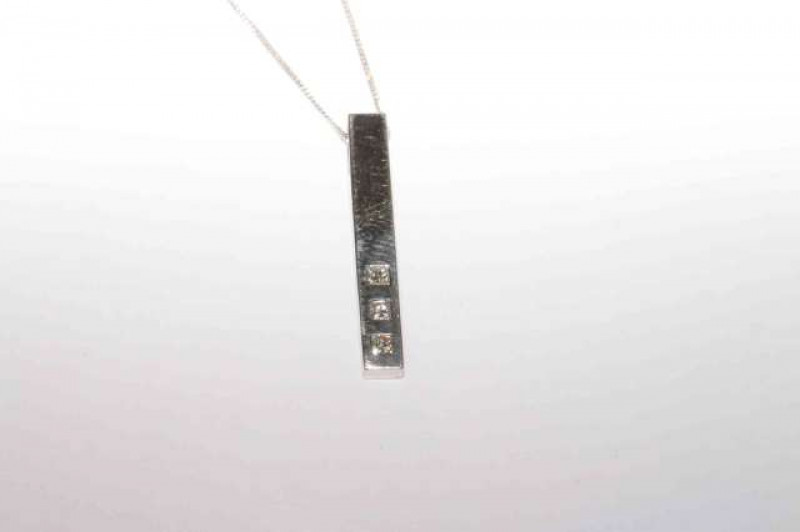 18 carat gold and princess cut diamond pendant on 18 carat gold chain