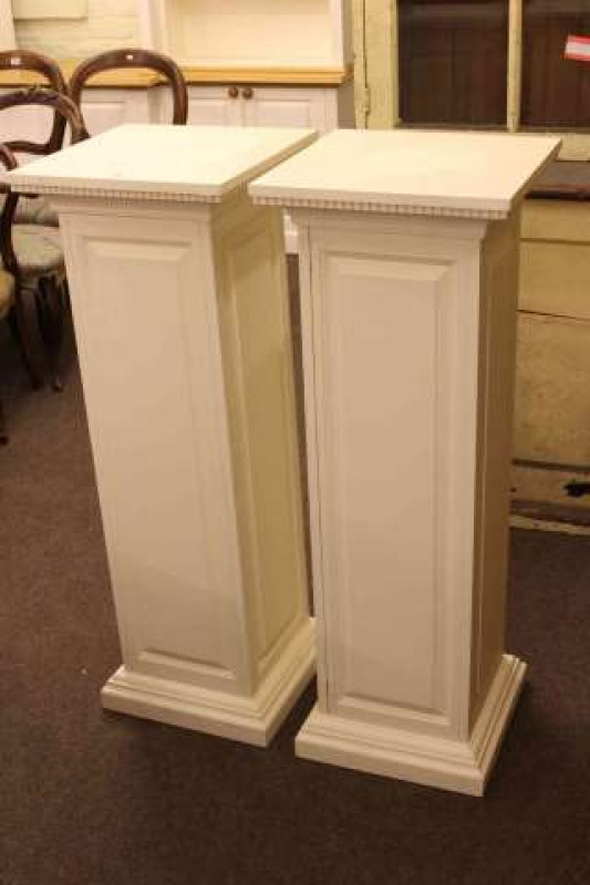 Pair of white painted square column pedestal stands, 112cm high
