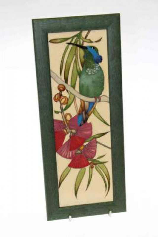 Moorcroft pottery plaque with stylised bird and foliate decoration