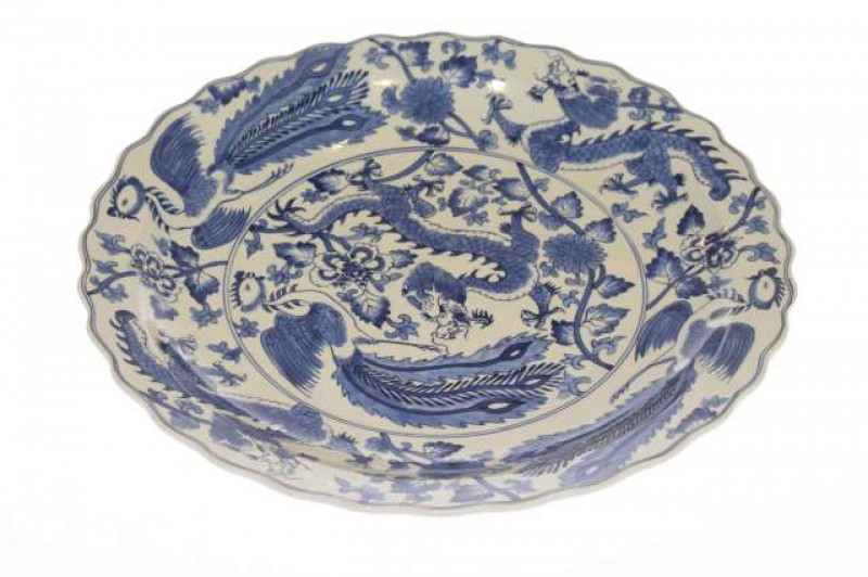 Oriental blue and white charger with dragon and floral design
