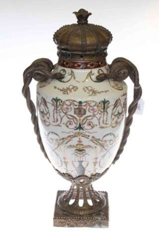Gilt metal mounted lidded vase with floral design