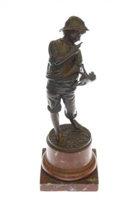 Bronze figure of boy with monkey on marble base