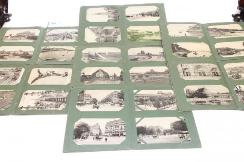 Seven albums of various postcards