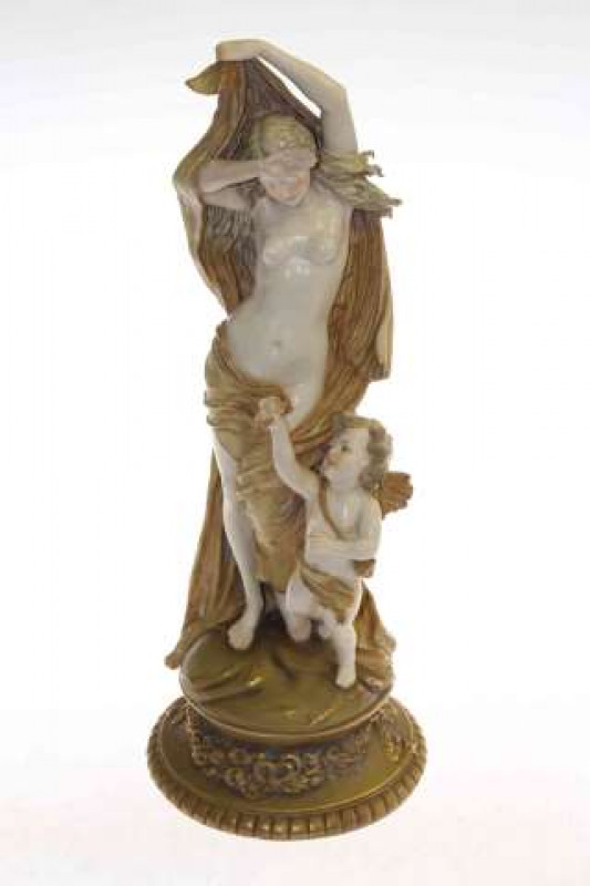 Ernst Wahliss figure group, modelled as a classical maiden and cherub, c.1900