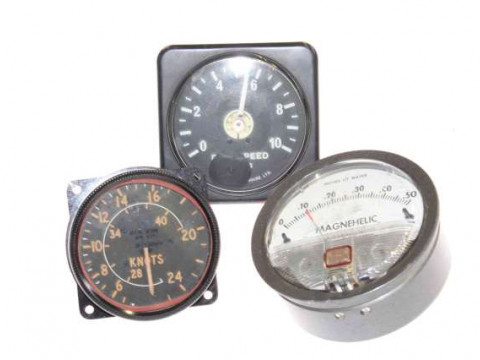 Three cockpit dials