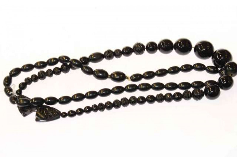 Two strings of beads (Jet?)