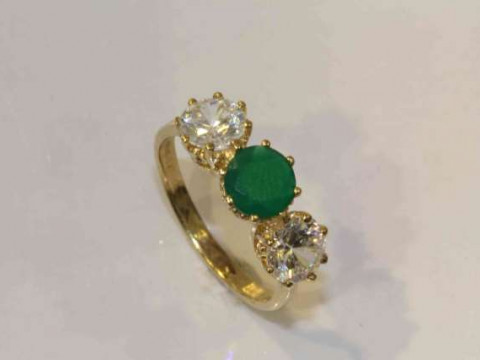 9 carat gold ring set with green and white stones