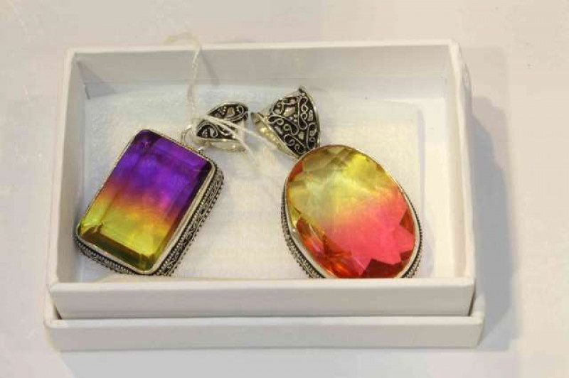 Two silver mounted pendants