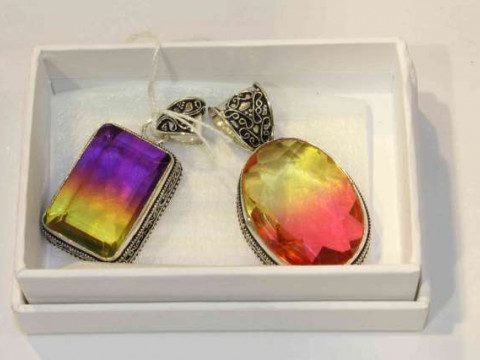 Two silver mounted pendants