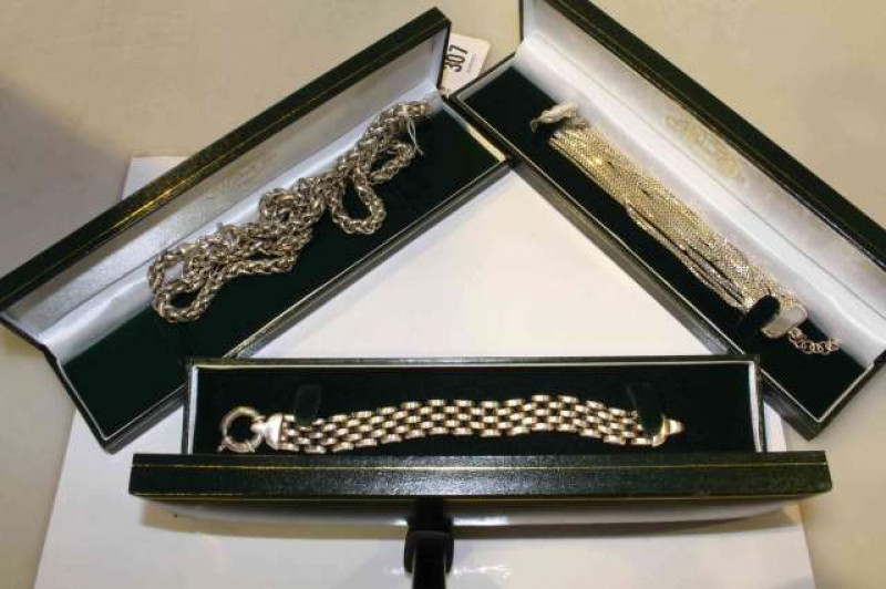 Silver chain and two silver bracelets