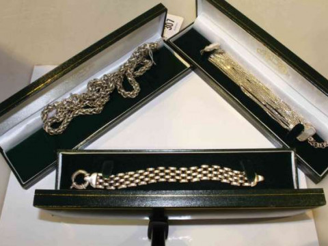 Silver chain and two silver bracelets