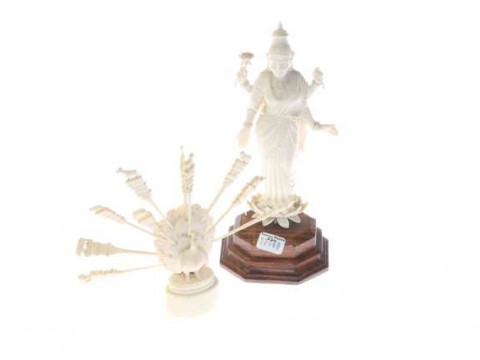 South-East Asian ivory figure of a goddess and an ivory peacock form toothpick...