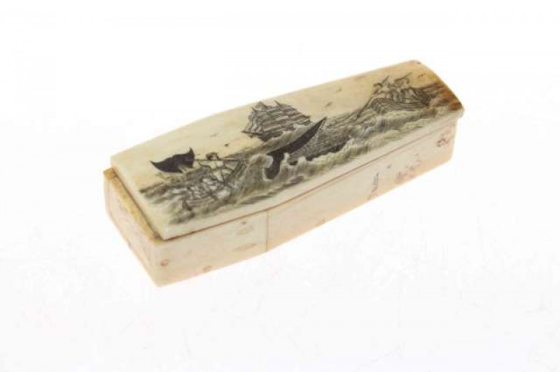 Bone scrimshaw decorated 'coffin' containing a model skeleton
