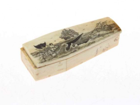 Bone scrimshaw decorated 'coffin' containing a model skeleton