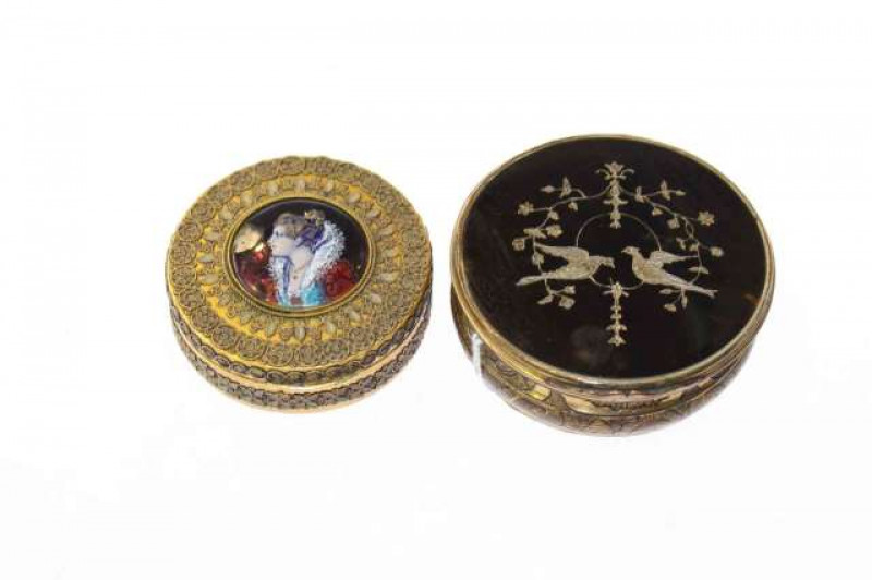 A tortoiseshell, brass and pique work snuff box, circular, the hinged cover probably inlaid with silver, late 18th Century, 7cm; together with a Limoges enamel and gilt-metal jewel box containing a Limoges enamel portrait brooch (3)