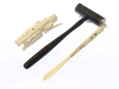 Early 20th Century ivory figure, bone letter opener and a gavel