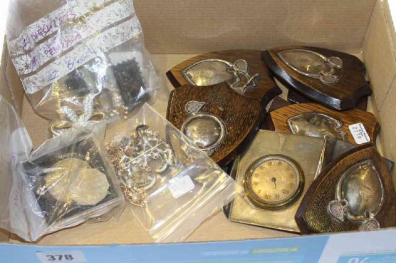 Silver shields, coins, costume jewellery and clock
