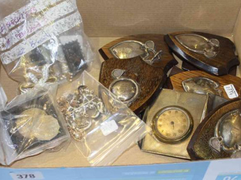 Silver shields, coins, costume jewellery and clock