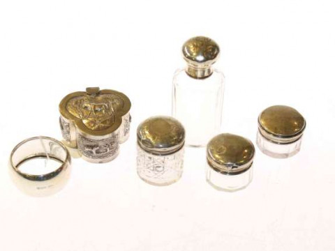 Silver napkin ring, silver topped jars, etc