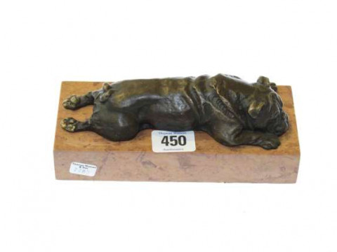 Bronze of a recumbent bulldog