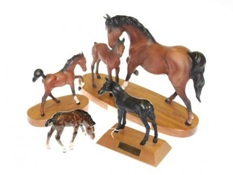 Four Beswick and Doulton horses