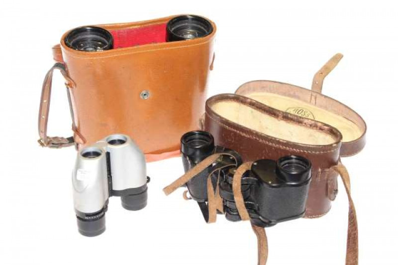 Three pairs of binoculars