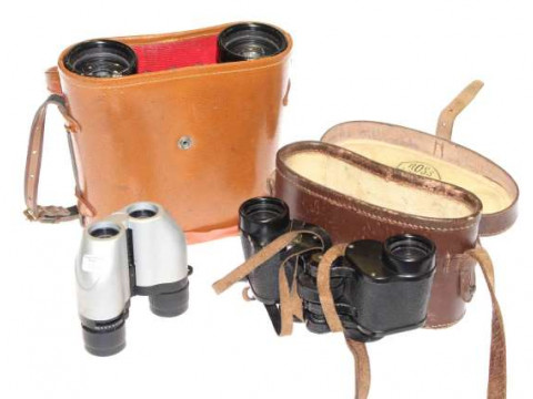 Three pairs of binoculars