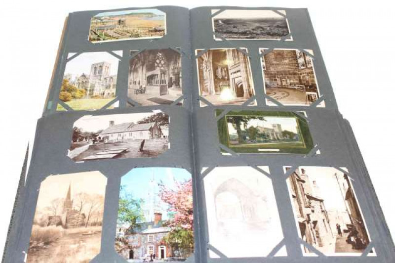 Two albums of postcards