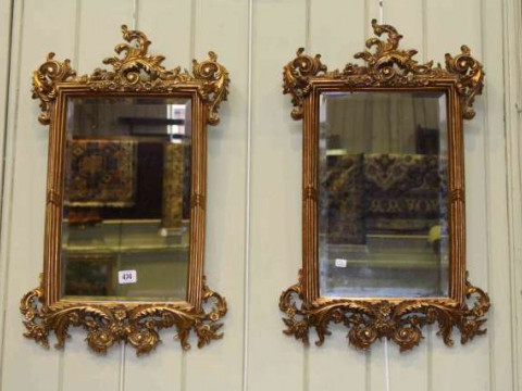 Pair ornate gilt framed rectangular bevelled wall mirrors