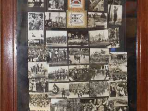Collection of Nazi Party photograph cards in oak frame
