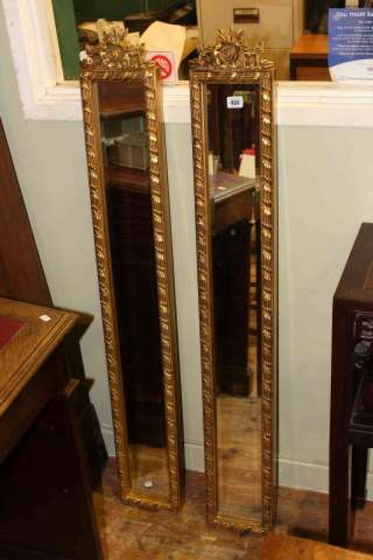Pair slim rectangular gilt framed bevelled wall mirrors