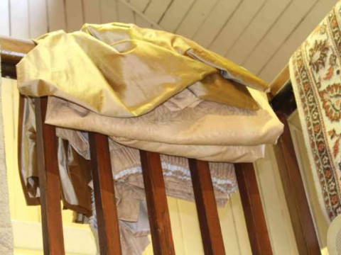 Pair sand coloured curtains and pelmet to fit window size 13ft x 67 inch...