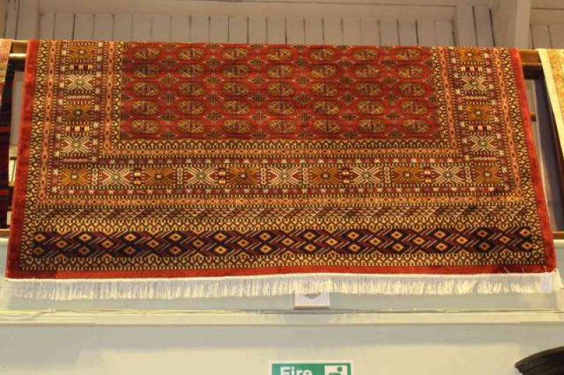 Bokhara carpet with a red ground 2.80 x 2.00
