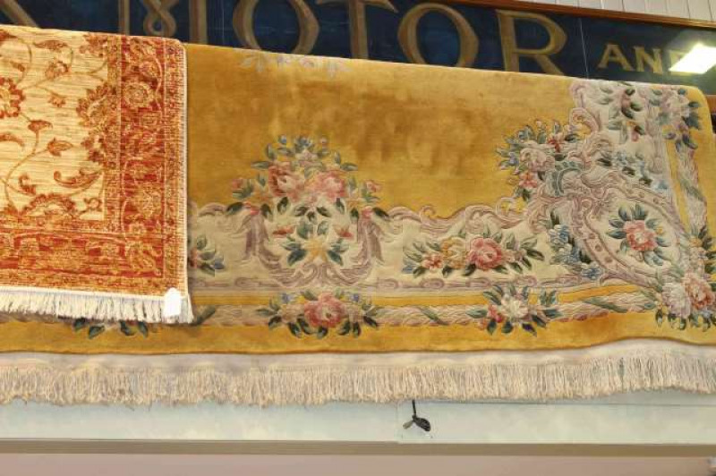 Chinese carpet with a mustard ground, 3.80 x 2.15