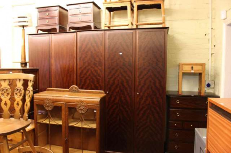 Stag Minstrel eight piece bedroom suite comprising triple and double wardrobes, five height chest, pair pedestal chests, triple mirror dressing table, stool and double bedstead