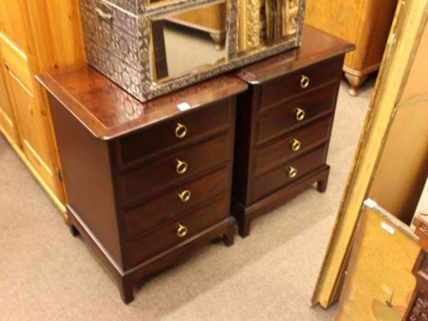Pair Stag Minstrel four height pedestal chests
