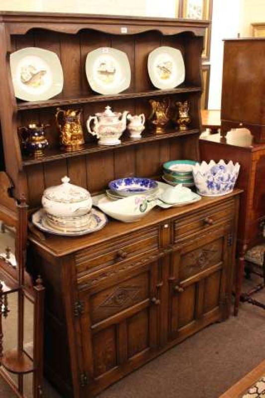 Carved oak shelf back dresser and large oak low centre table (2)