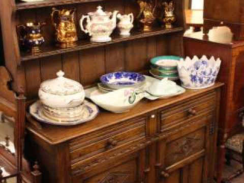 Carved oak shelf back dresser and large oak low centre table (2)