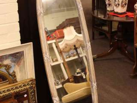 Oval gilt and painted easel cheval mirror