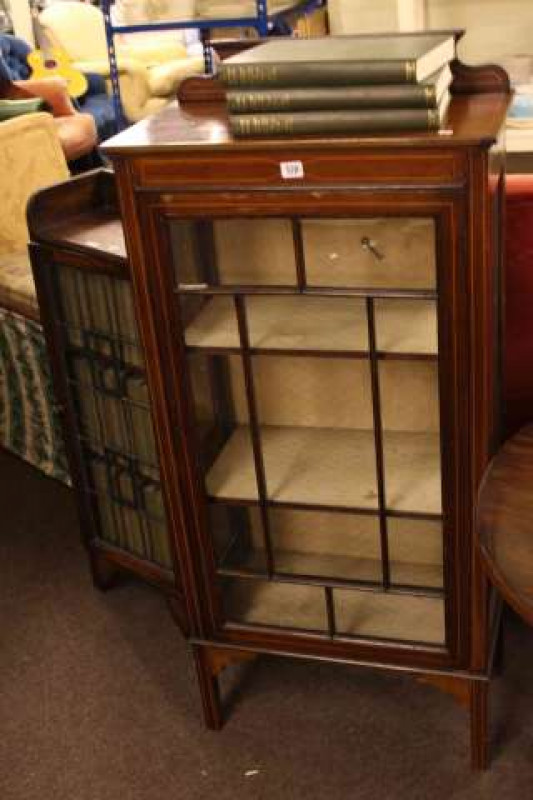 Edwardian mahogany and string inlaid single door china cabinet, slim oak bookcase and thirty five volumes of Encyclopedia Britannica