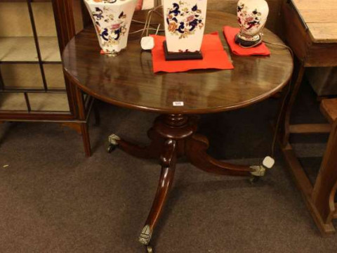 Circular mahogany snap top supper table