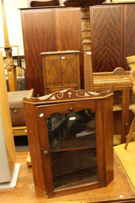Oak two drawer writing table, glazed door corner wall cabinet, plant stand and toilet mirror (4)