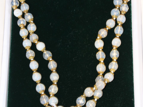 Long strand of beads, possibly moonstones
