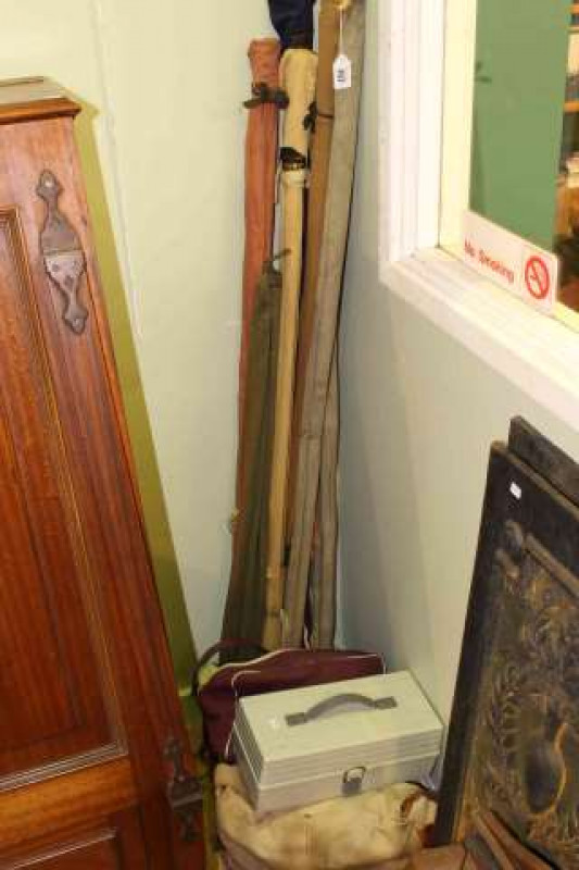 Collection of various fishing rods, reels and accessories