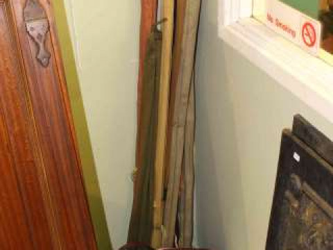 Collection of various fishing rods, reels and accessories