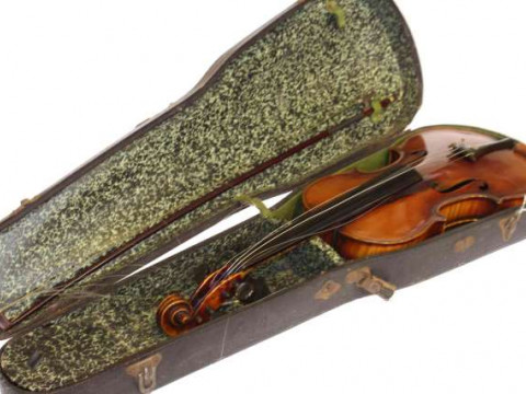 Cased violin and bow