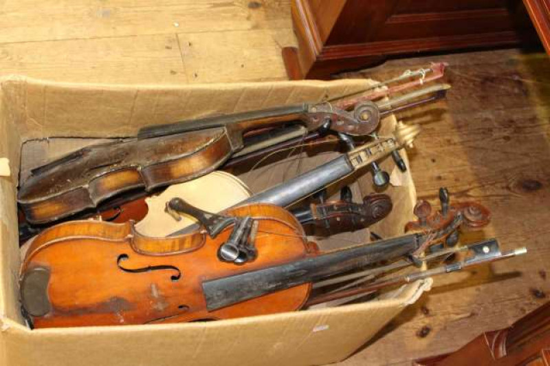 Five various violins and three bows
